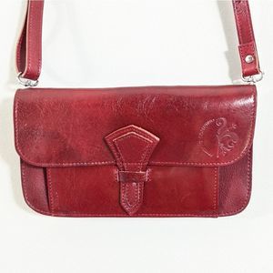 Anonimo Florentino red cross body bag